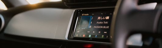 apple music on the carplay screen of car stereo